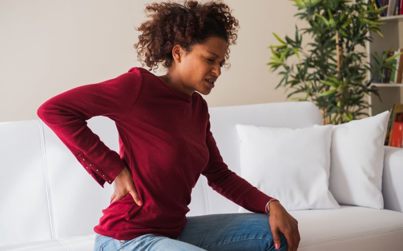 women having back pain image