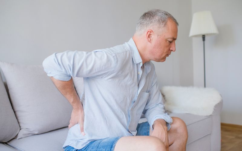 image of men having back pain